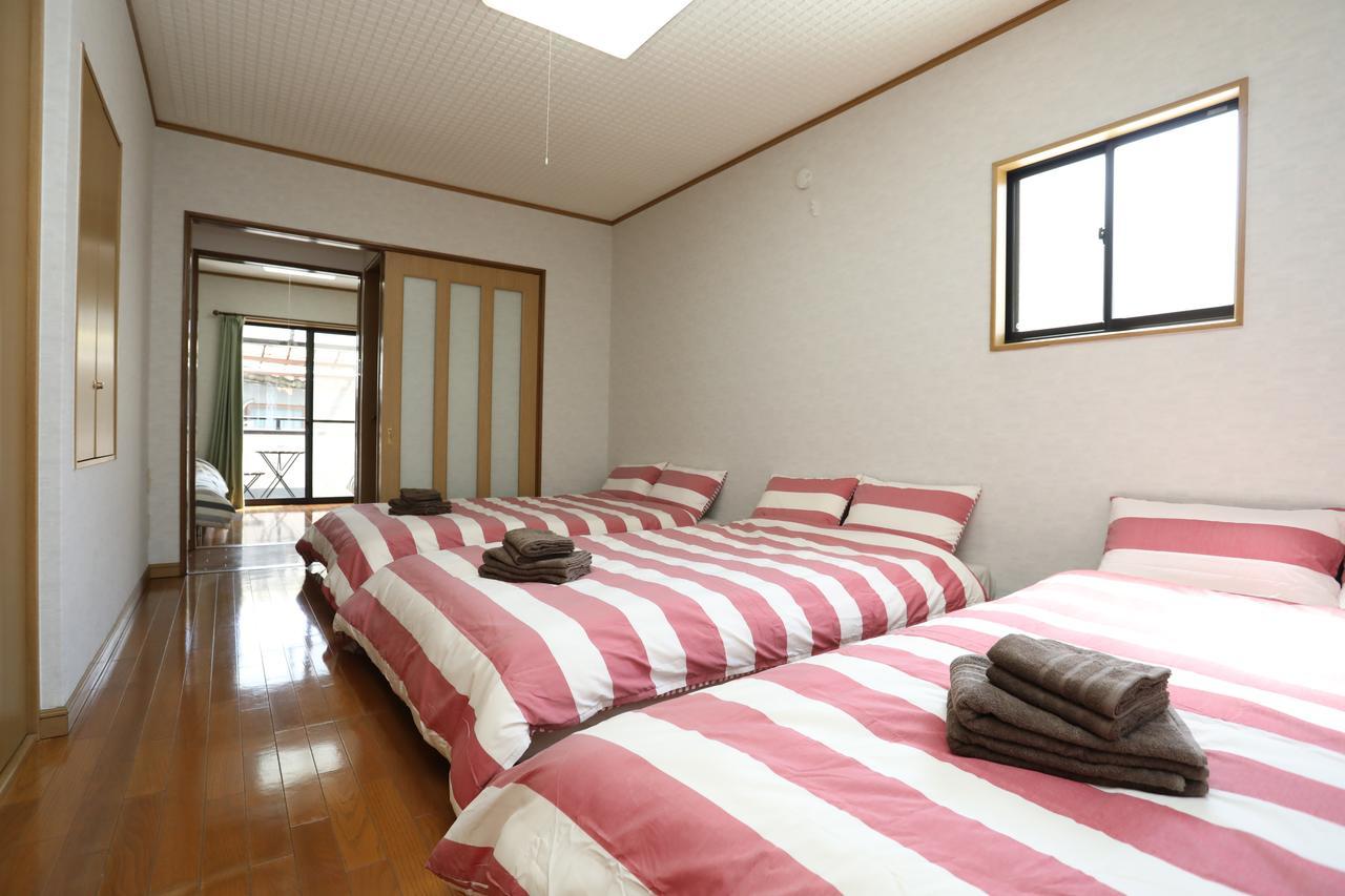 Yamanoyado Tsuru Pension Osaka Buitenkant foto