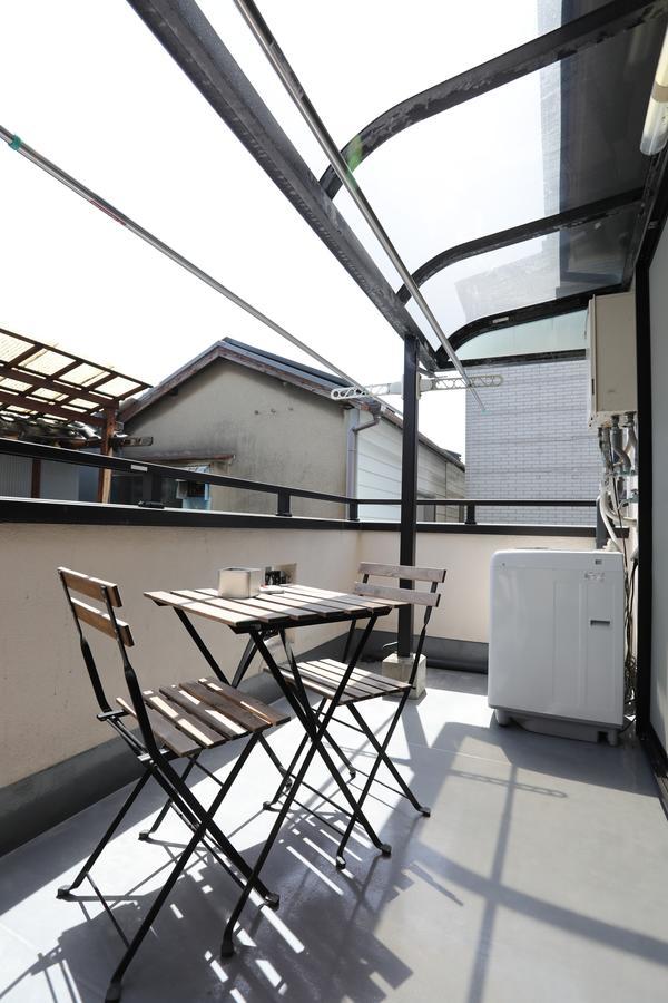 Yamanoyado Tsuru Pension Osaka Buitenkant foto