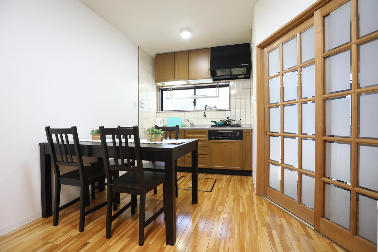Yamanoyado Tsuru Pension Osaka Buitenkant foto