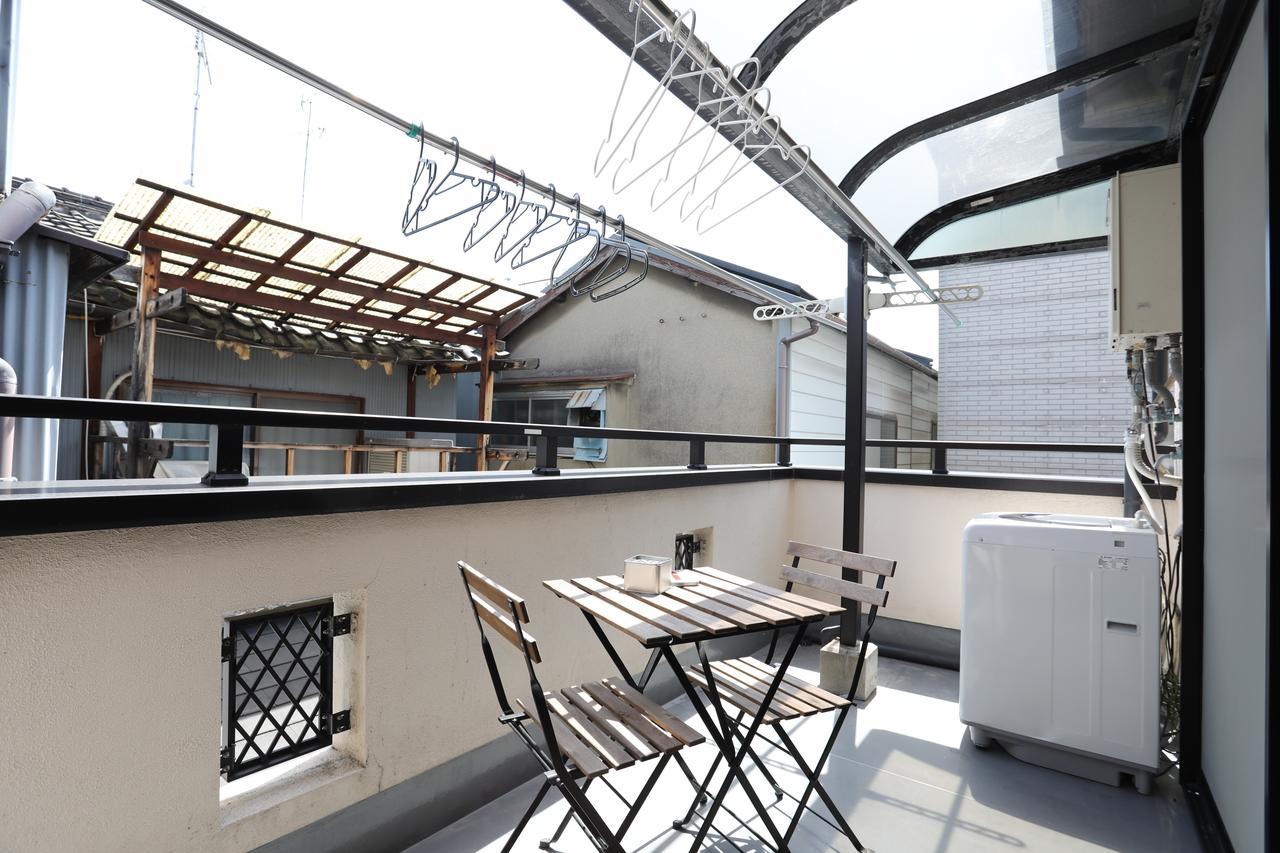 Yamanoyado Tsuru Pension Osaka Buitenkant foto