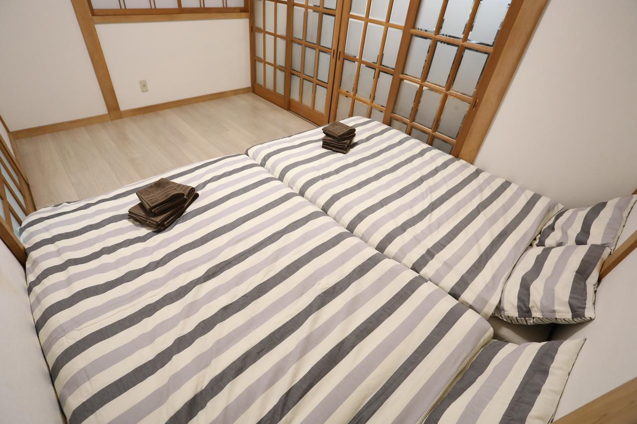 Yamanoyado Tsuru Pension Osaka Buitenkant foto